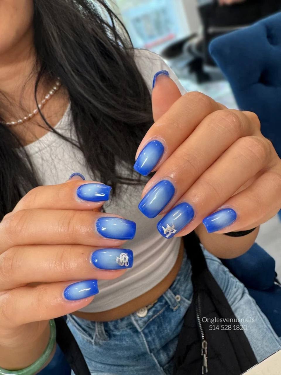 Blue ombré nail design.