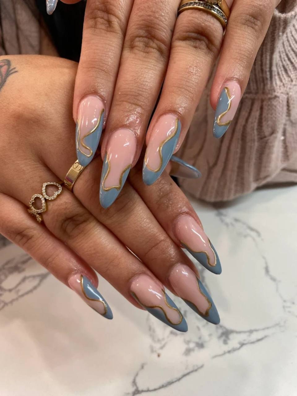 Blue and gold nail art.