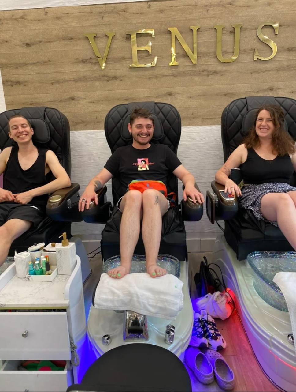Pedicure with pale polish.