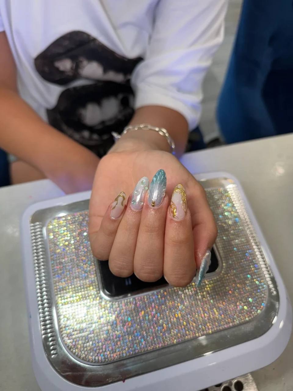 Crystal nail art details.